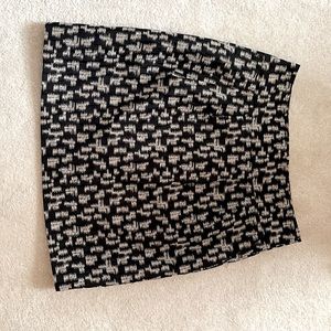 Ann Taylor Black and Gold Mini Skirt with pockets